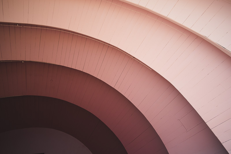 Close up of the pink-hued Napier soundshell outdoor stage on Marine Parade