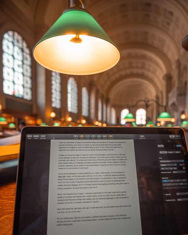 Laptop set up for writing in the Reading Room at Boston Public Library